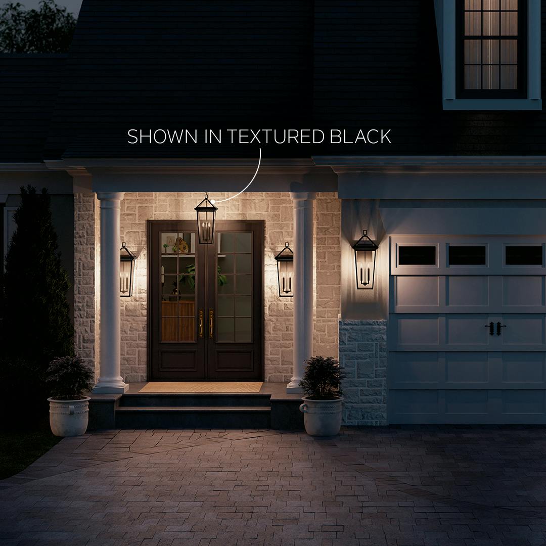 Garage at night with the Regence 26" 2 Light Outdoor Wall Light in Textured Black