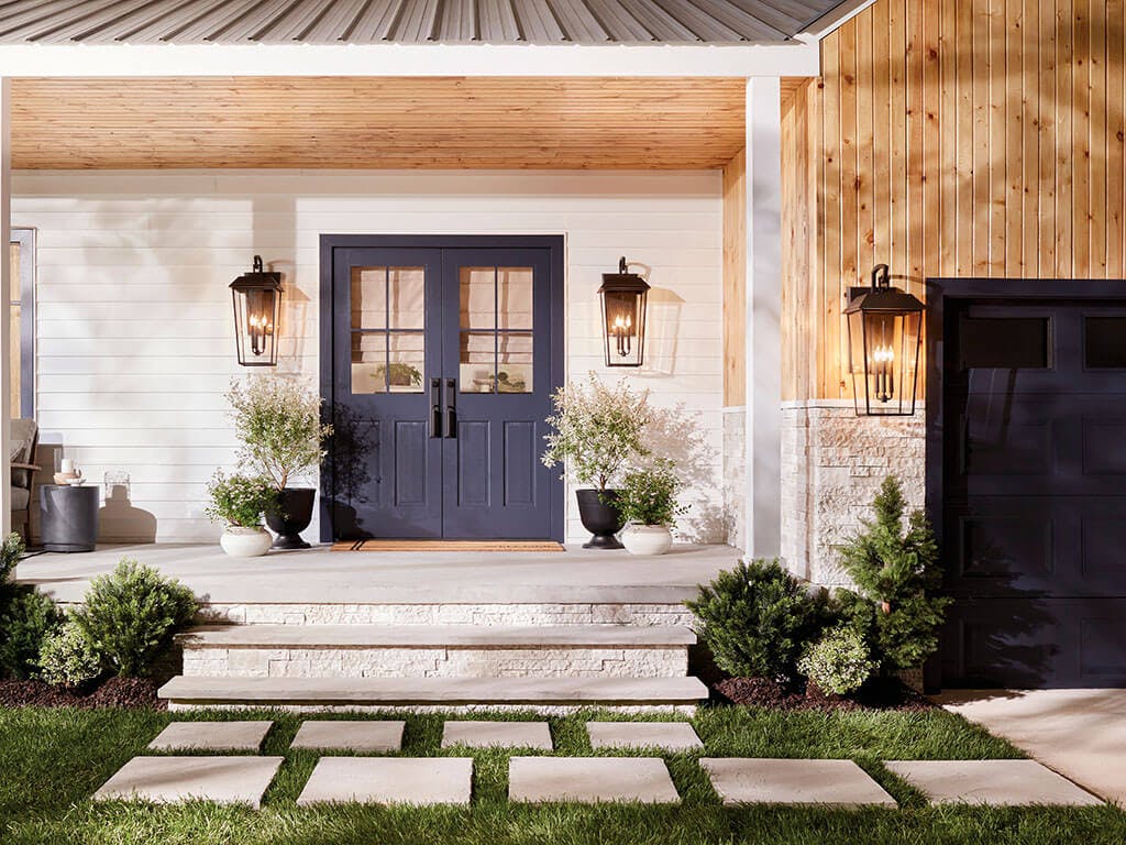 Porch featuring the Mathus 30.25" 3 Light Outdoor Wall Light with Clear Glass in Olde Bronze