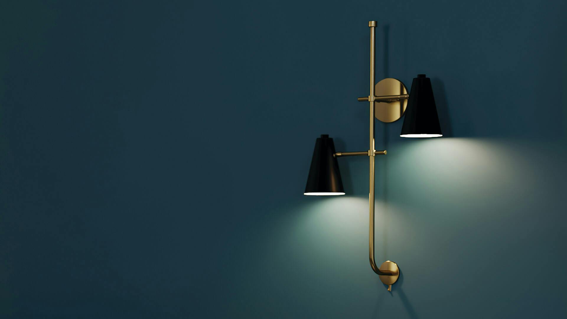 Close-up of a Sylvia wall sconce lighting up a blue wall