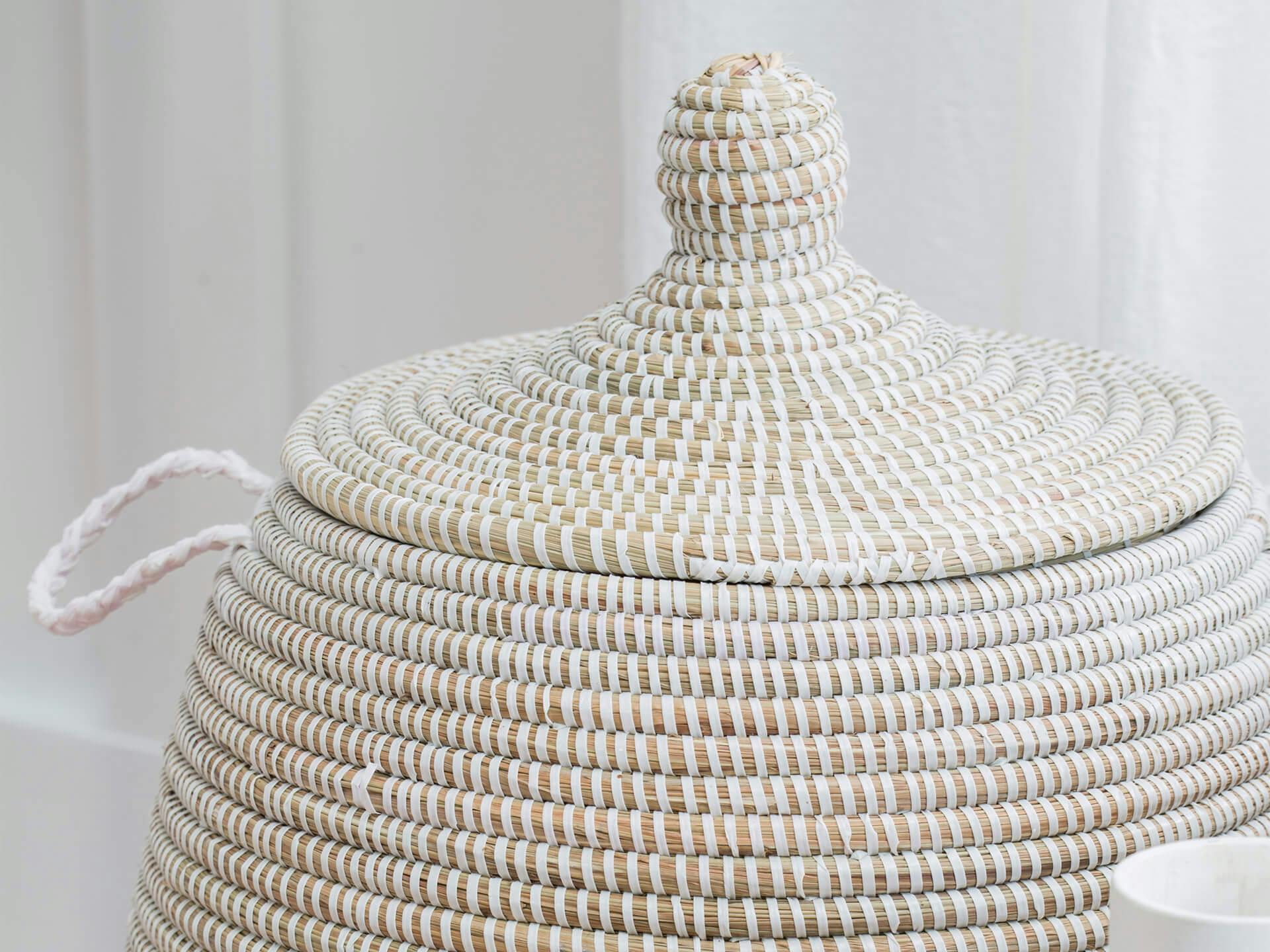 Upper portion of a woven white basket