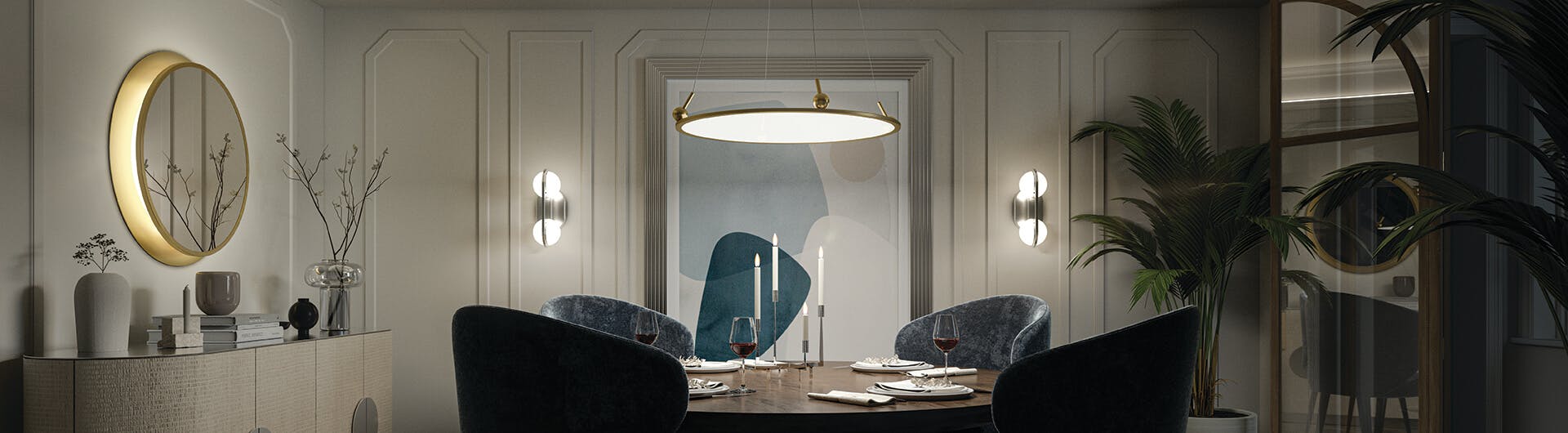 Dining room at night lit up by a Jovian pendant above the table, two Brettin vanity lights on the back wall and a Chennai vanity mirror to the left