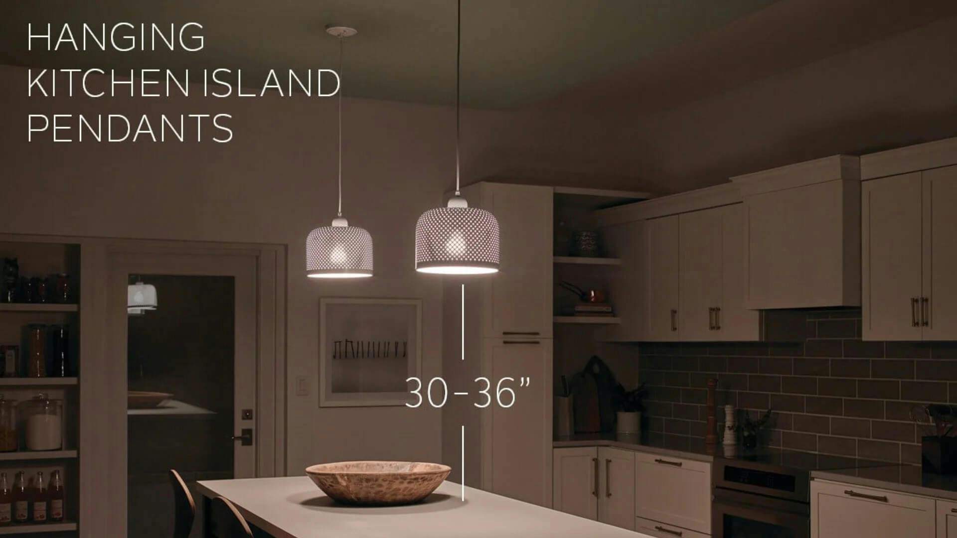 Two hanging pendants over a kitchen island with text showing they're 30-36" above the surface