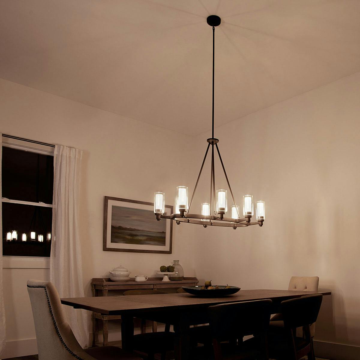 Night time dining room image featuring Circolo chandelier 2345OZ