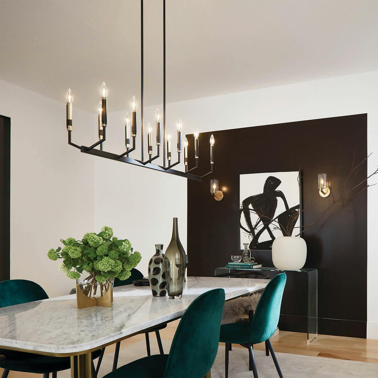 Dining room with Armand chandelier and vintage light bulbs