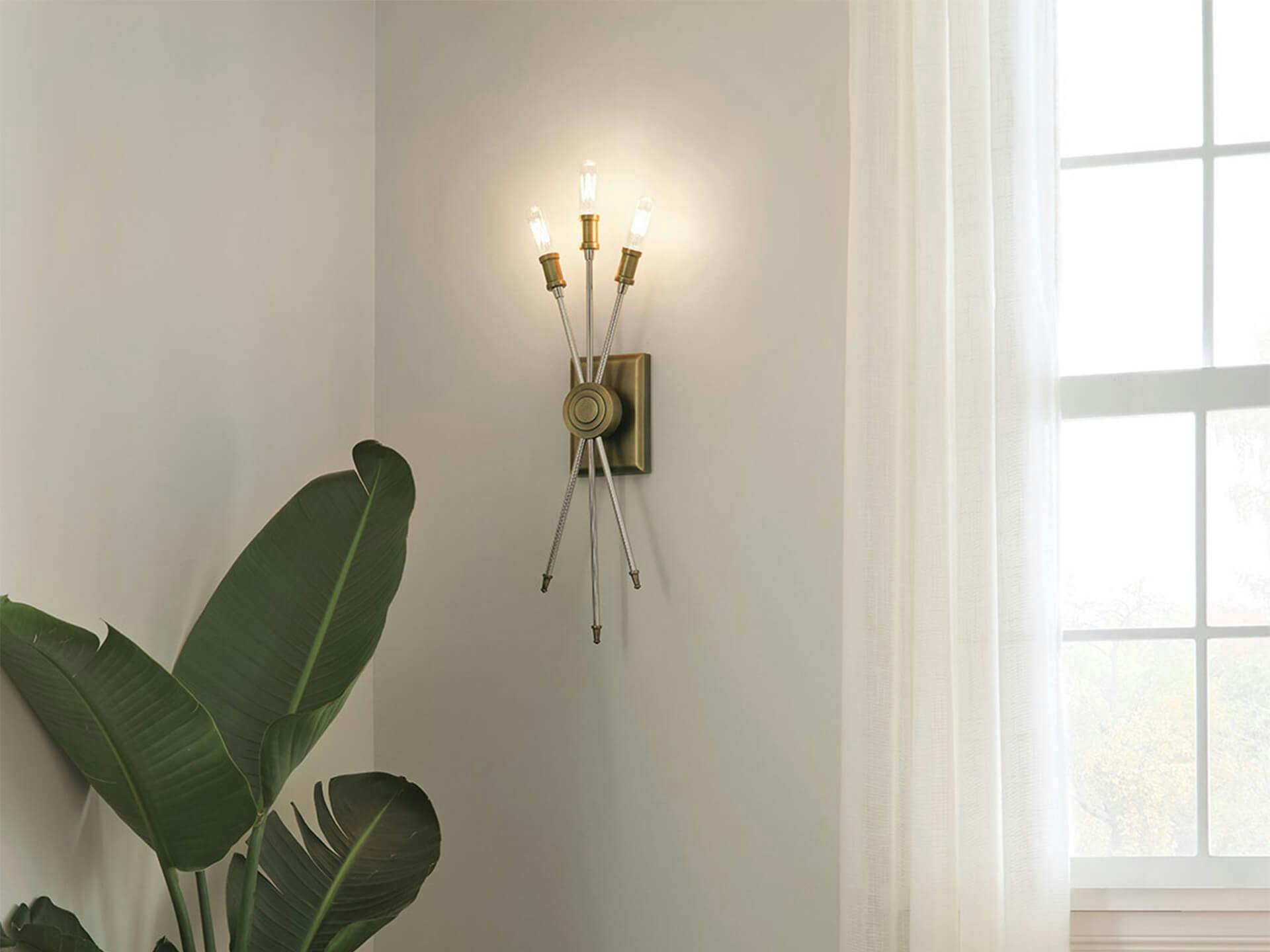 3 Light Doncaster sconce mounted in living room