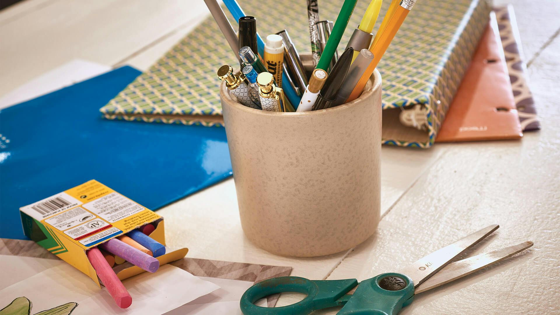 Arts and crafts supplies on a child's desk