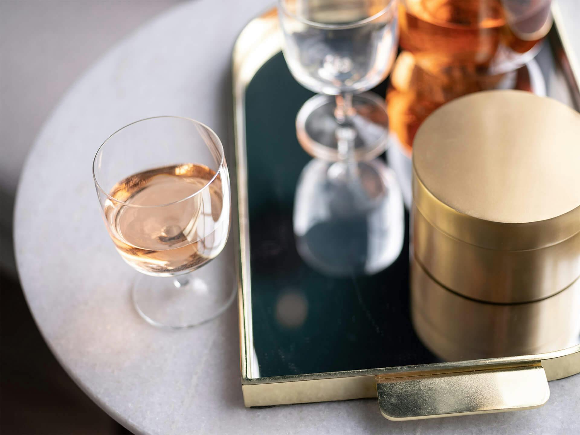 Glassware on gold table tray.
