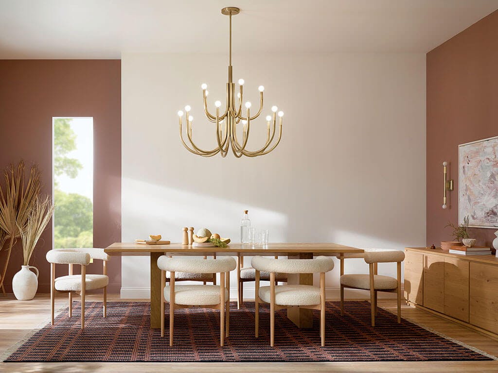 Day time dining room with the Odensa 40 Inch 15 Light Chandelier in Champagne Bronze