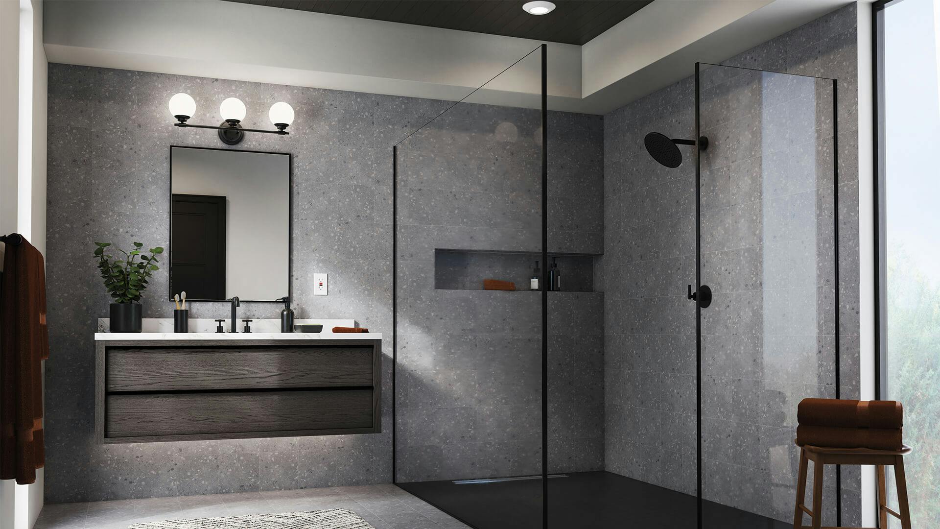 Gray bathroom with glass shower and modern vanity with Benno 3-light vanity light in black
