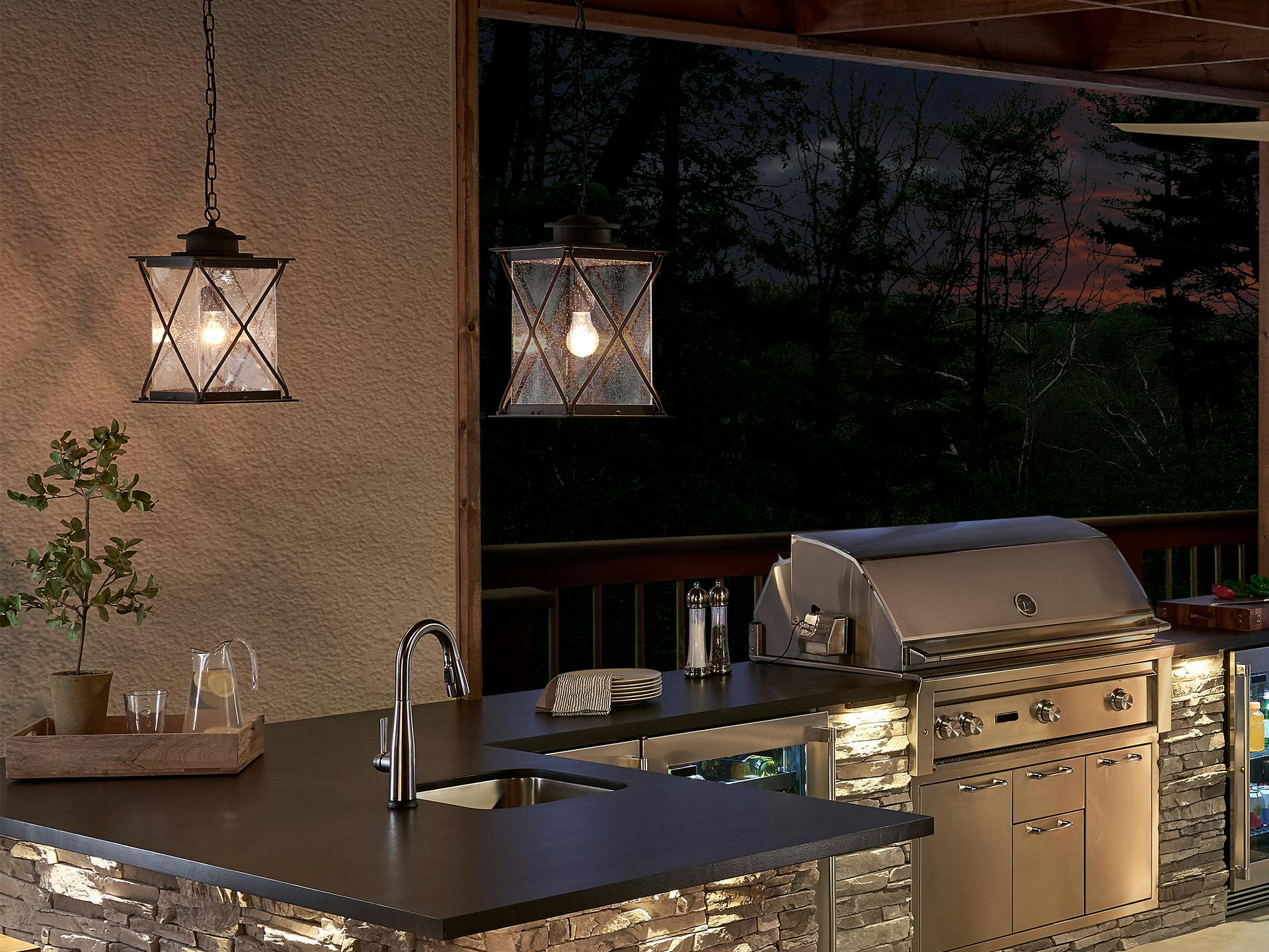 2 Argyle pendants hanging over outdoor sink at night