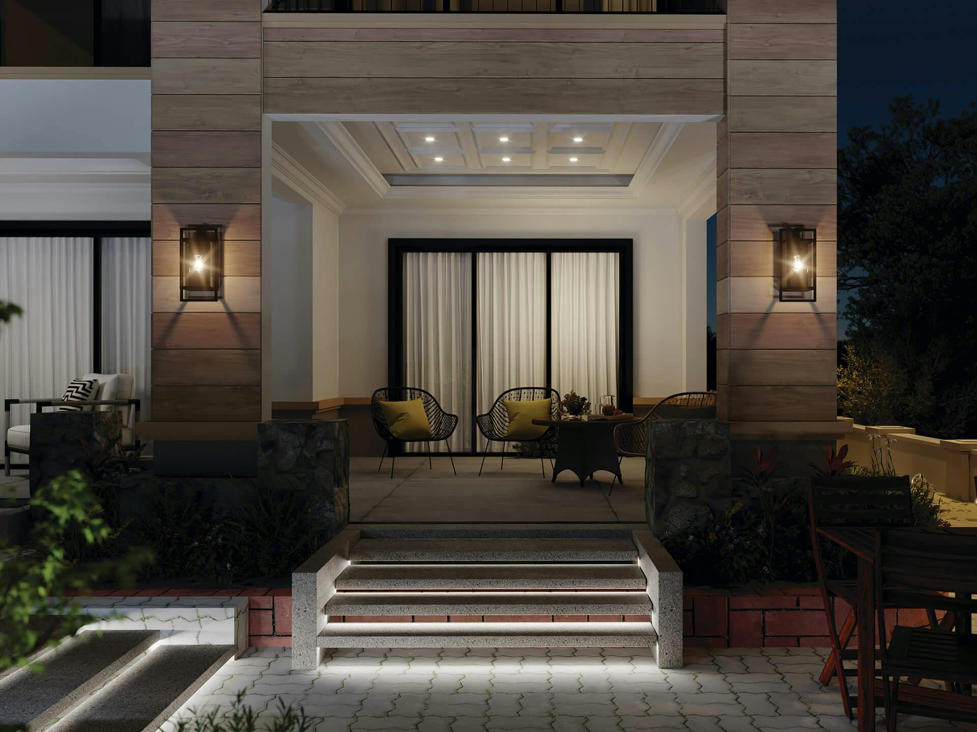 Porch exterior at night with two goson wall sconces in black finish