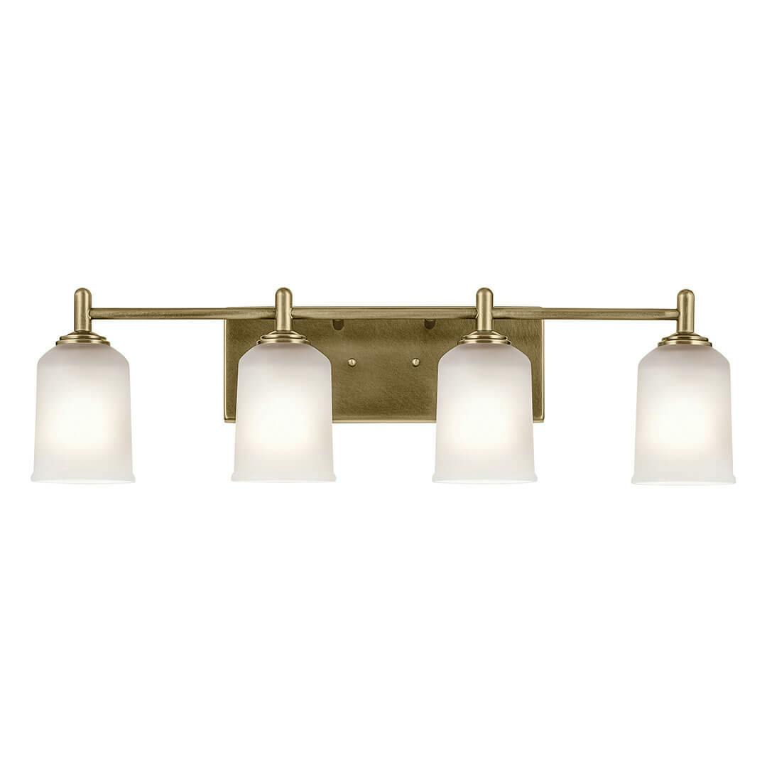 The Shailene 29.75" 4-Light Vanity Light in Natural Brass mounted down on a white background