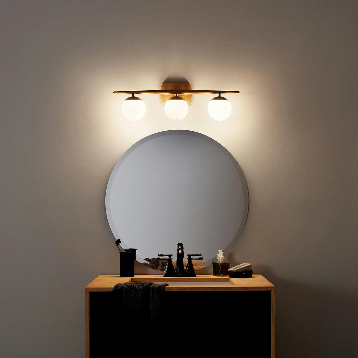 Night time Bathroom featuring Jasper vanity light 45582NBR