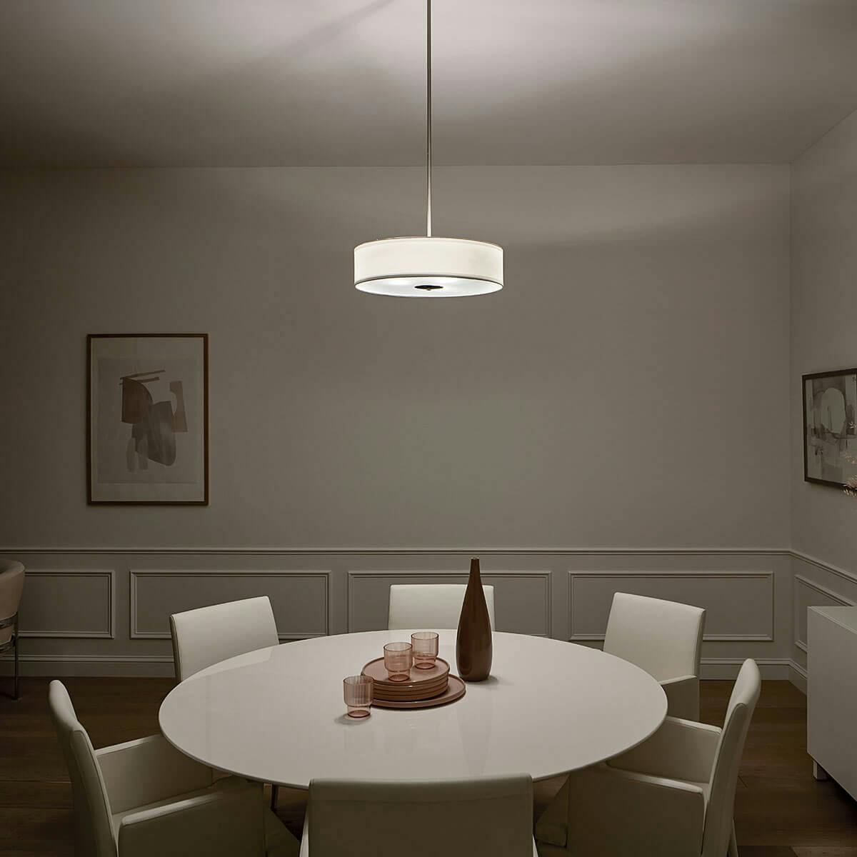 Night time dining room image featuring flush mount light 42121OZ