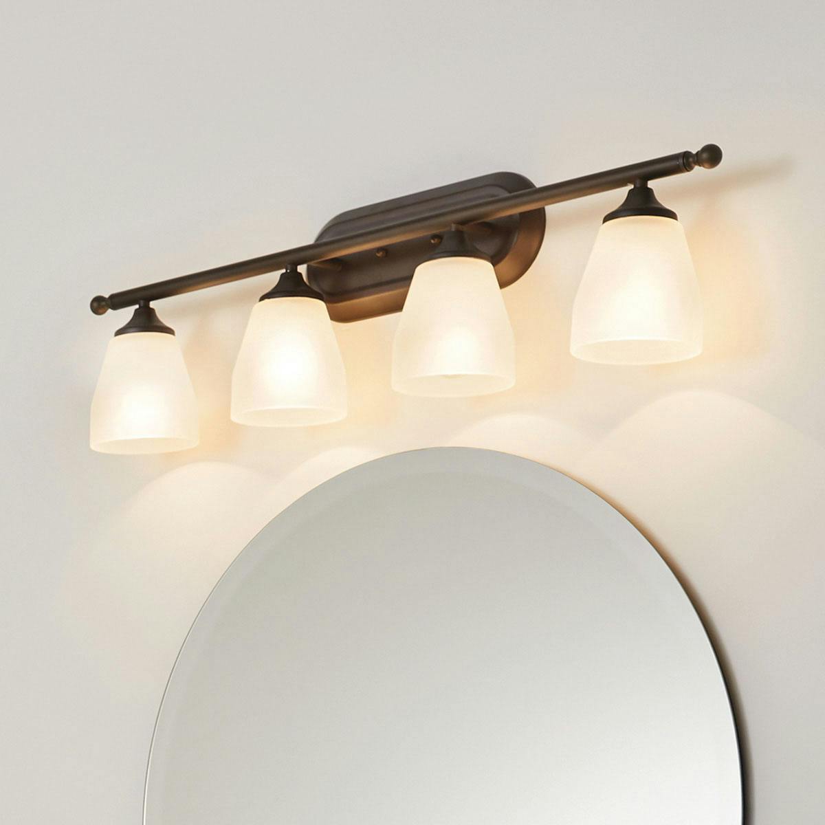 Day time Bathroom featuring Ansonia vanity light 5449OZ
