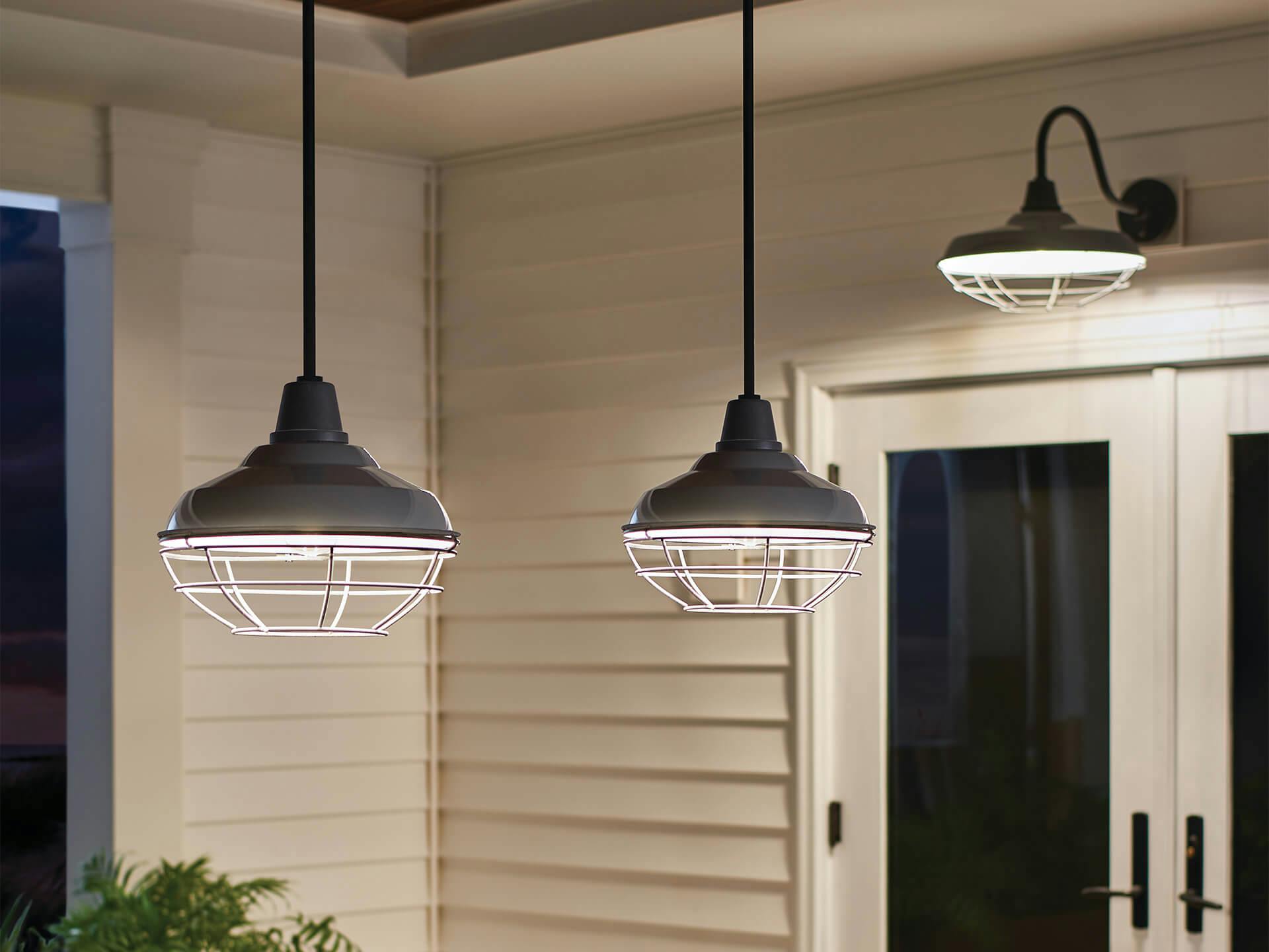 close up of Pier Outdoor hanging lights and Pier Outdoor wall light lighting up an outdoor porch 