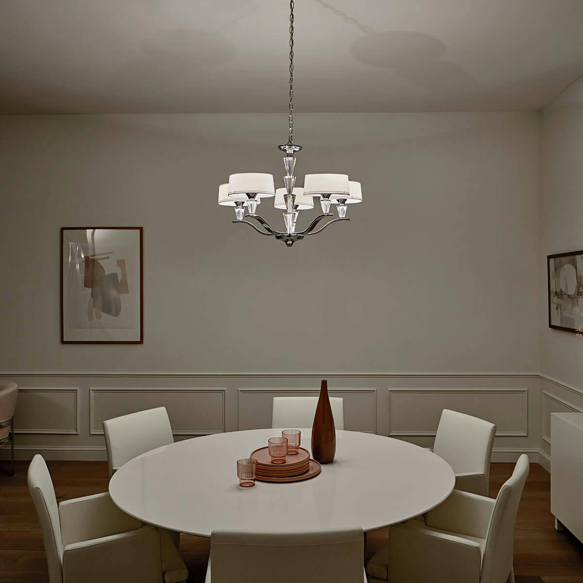 Night time dining room image featuring Crystal Persuasion chandelier 42030CH