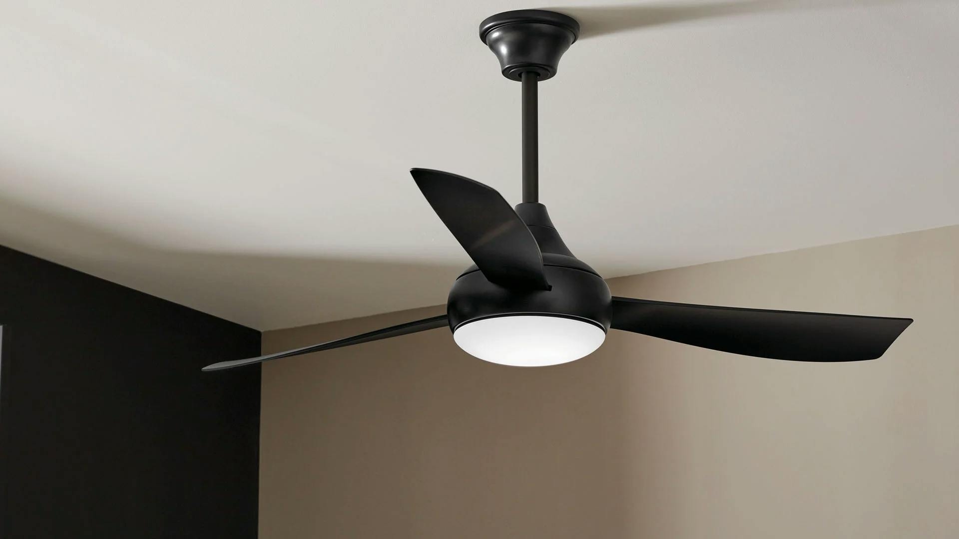 Close up of a black ample ceiling fan.