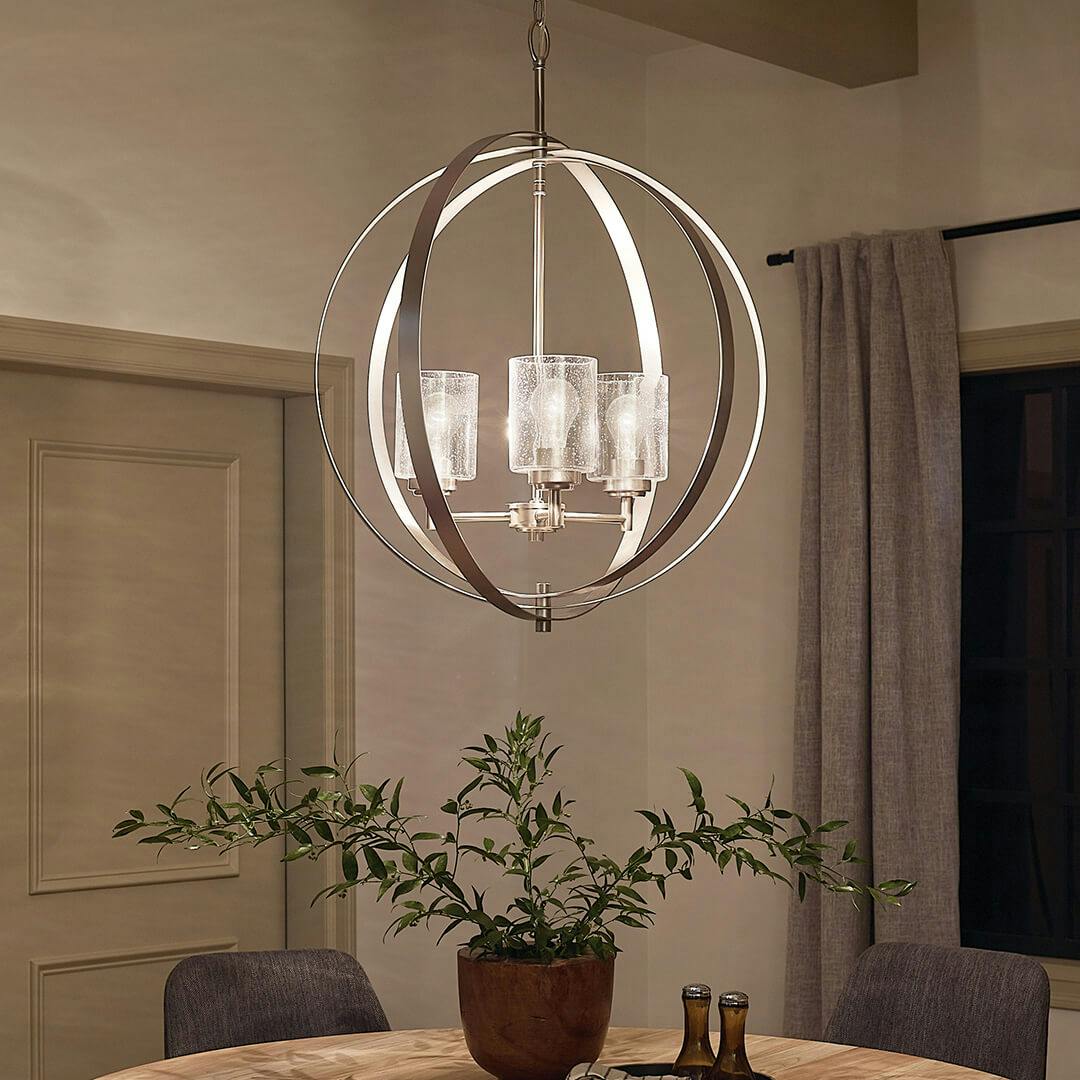 Winslow 3 Light Chandelier Brushed Nickel in a dining room a night