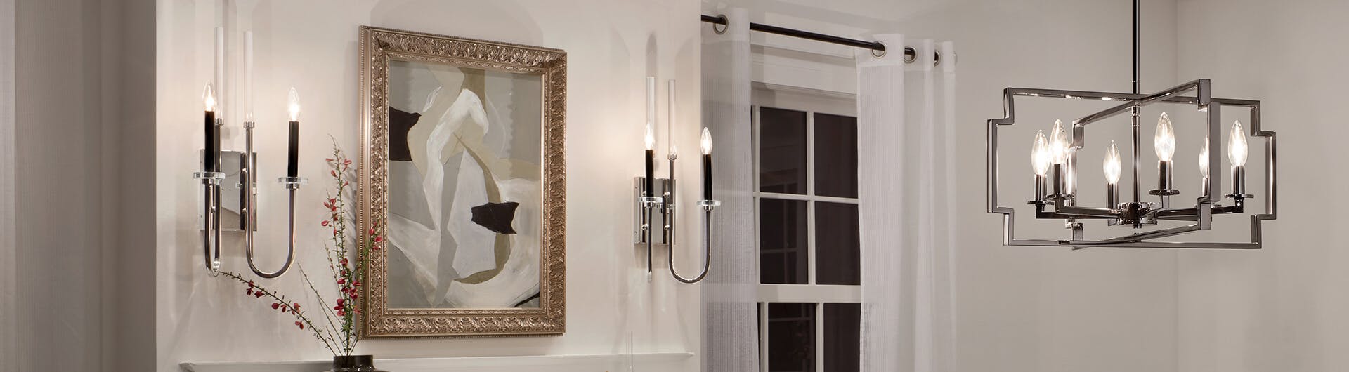 Header image of Kadas and Horizon chandelier and wall sconce lights at night