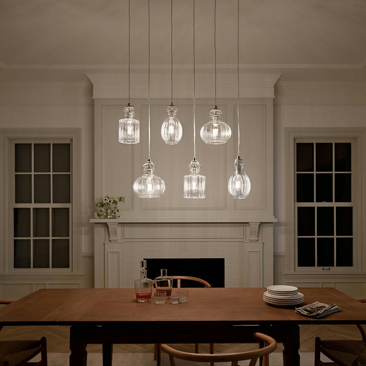 Night time dining room image featuring Riviera chandelier 43950NI