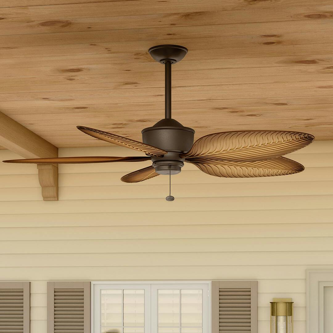Porch with the 56" Nani 5 Blade Weather+ Outdoor Ceiling Fan in Satin Natural Bronze and Ivory with Walnut Blades