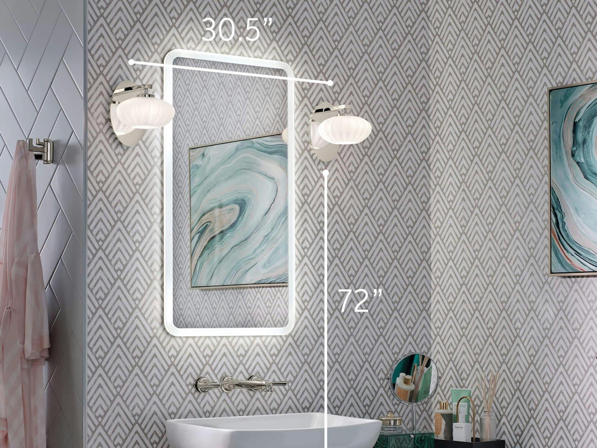 An example measurement guide featuring two Pim silver sconces on either side of a bathroom mirror, 30.5 inches apart and 72 inches from the ground