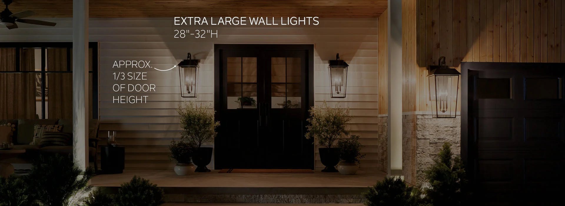 Exterior of a home featuring 3 mathus sconces in black, illustrating "Extra Large Wall Lights" at 28 to 32 inches tall and approximately one third of the heigh of the front door.