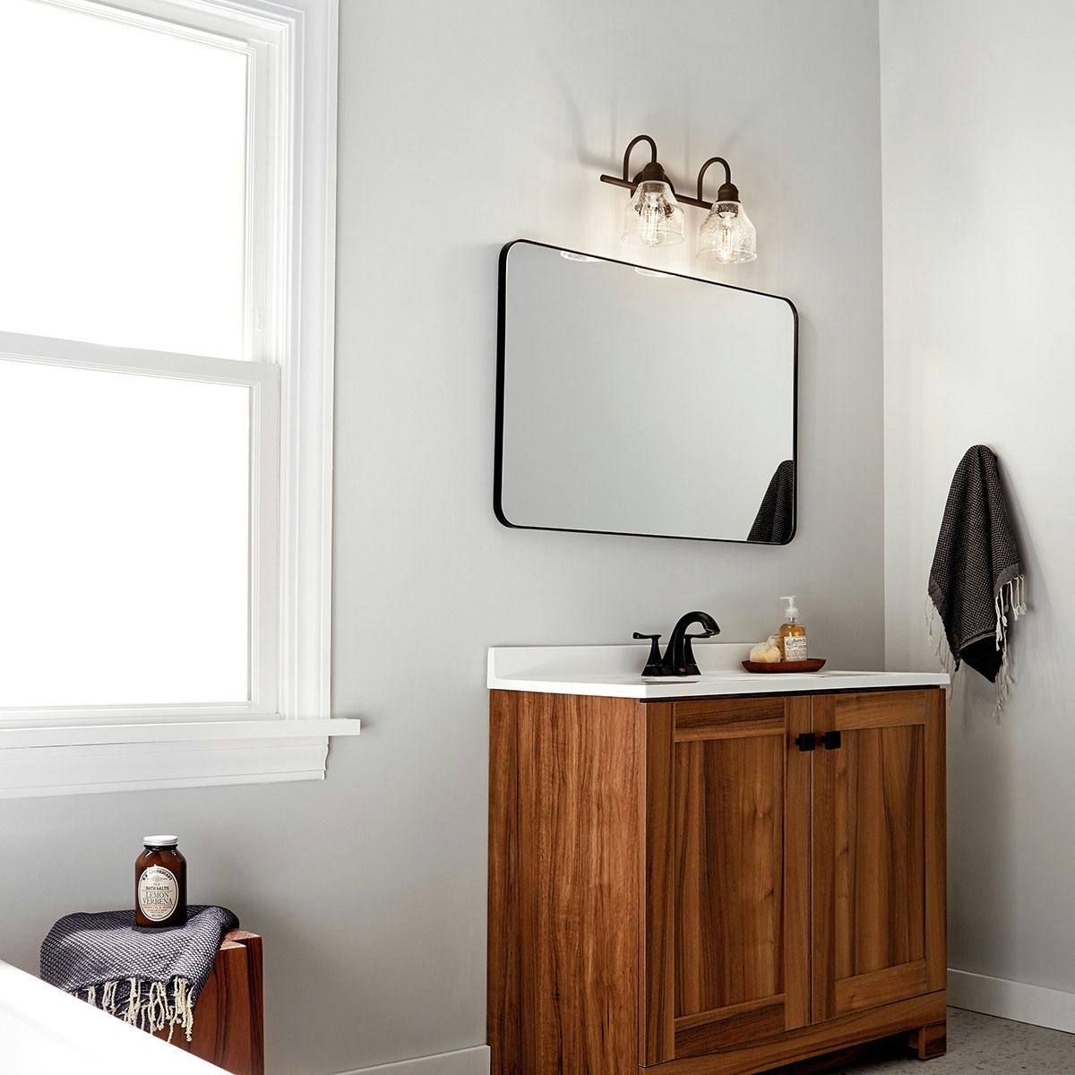 Day time Bathroom featuring Avery vanity light 45972OZ