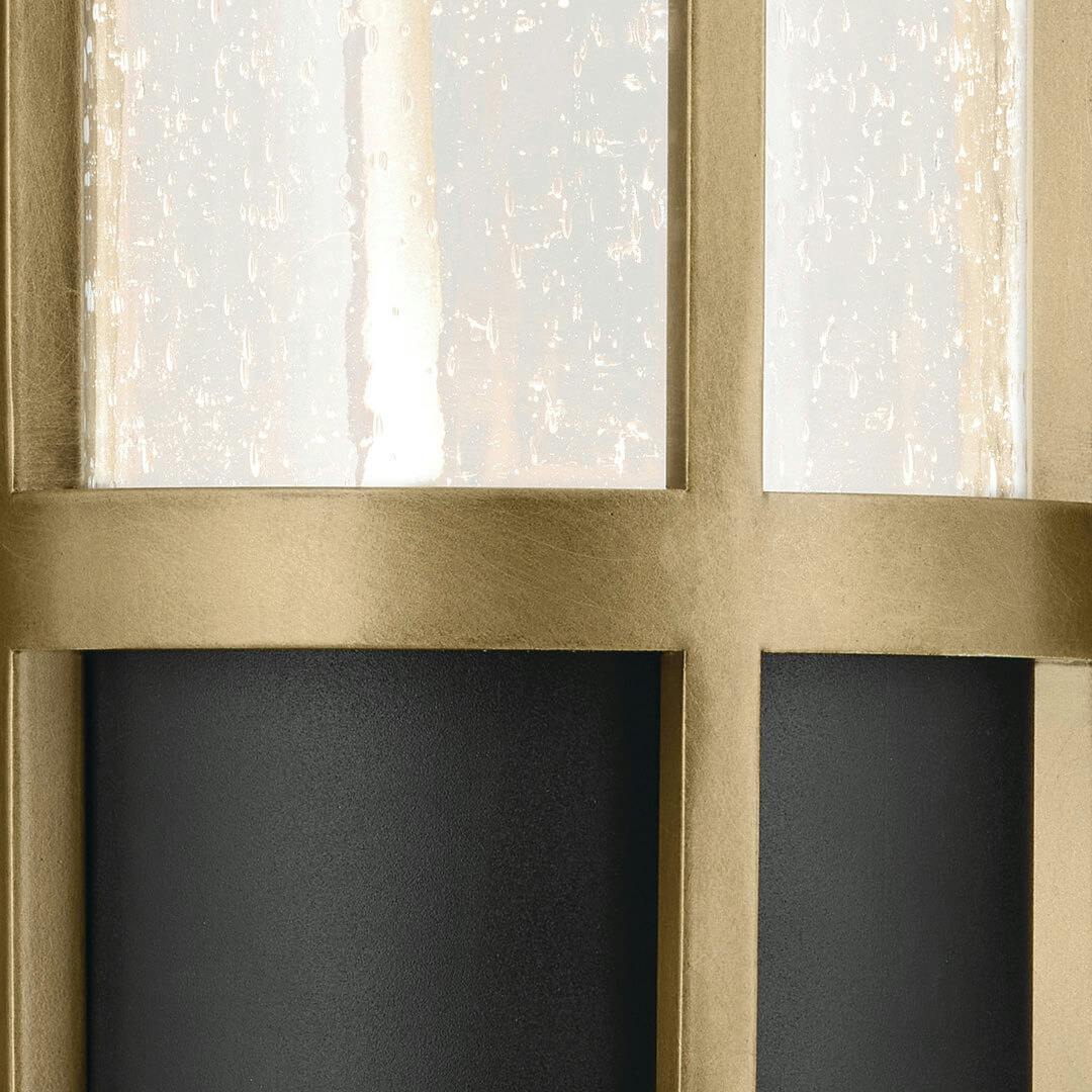 Close up view of the Camillo 22.5" LED Outdoor Post Light with Clear Seeded Glass in Textured Black with Natural Brass