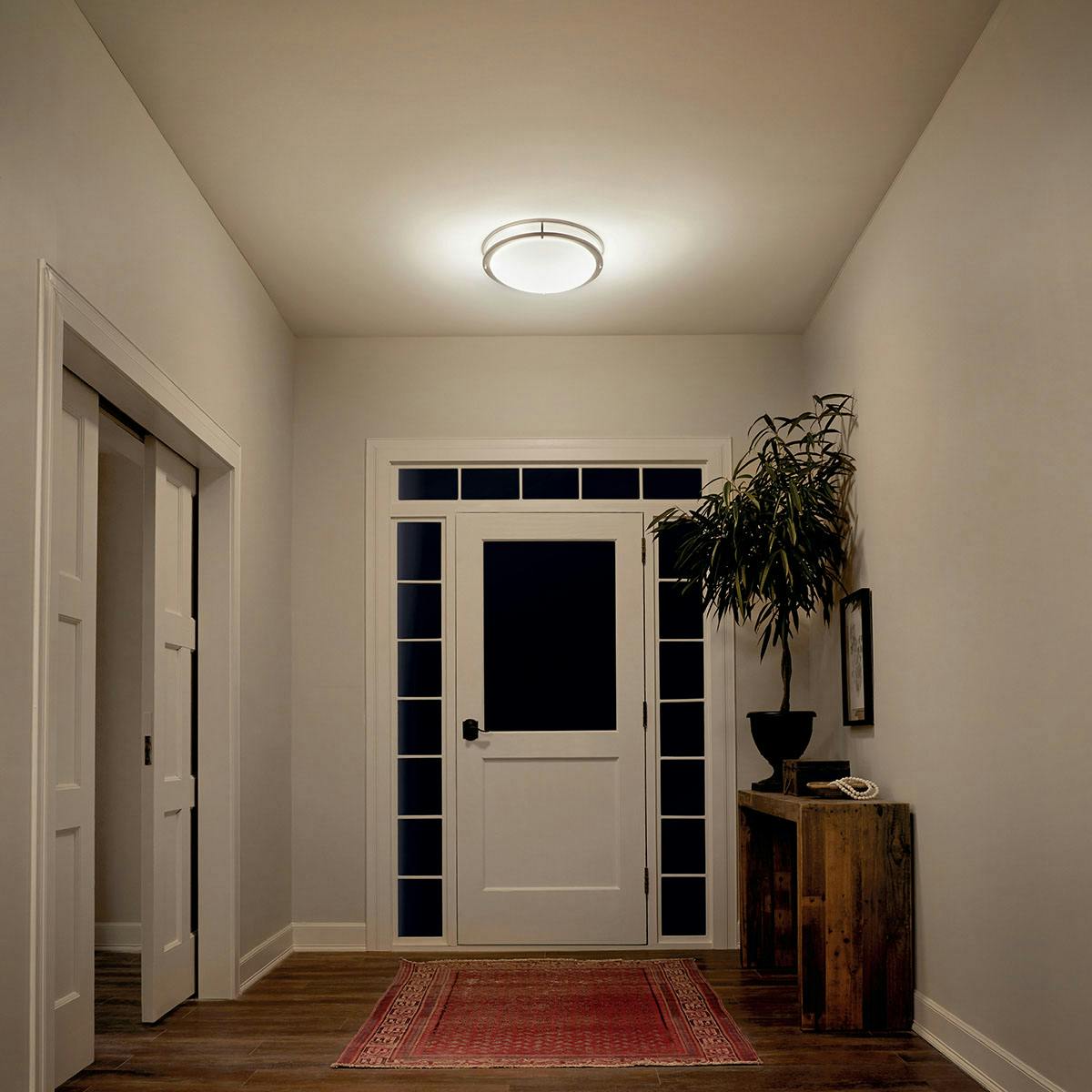 Night time Hallway image featuring Avon flush mount light 10789NILED