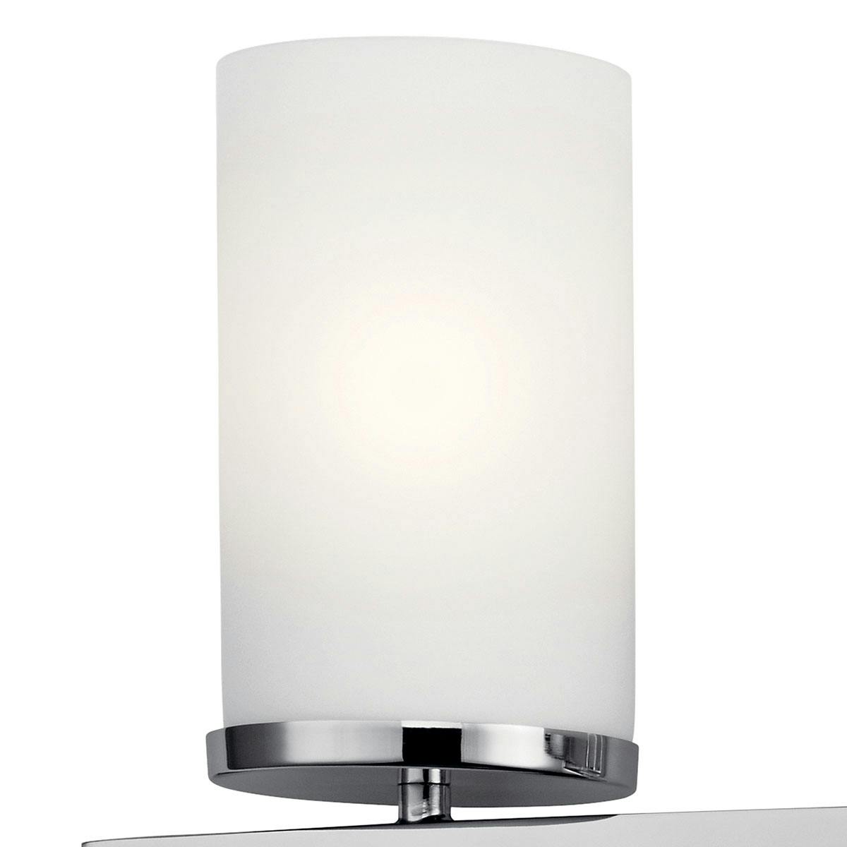 Close up view of the Crosby 31" Vanity Light in Chrome on a white background