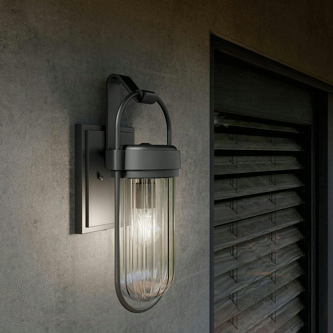 Deck featuring the Brix 19.25" 1 Light Outdoor Wall Light with Ribbed Clear Glass in Textured Black