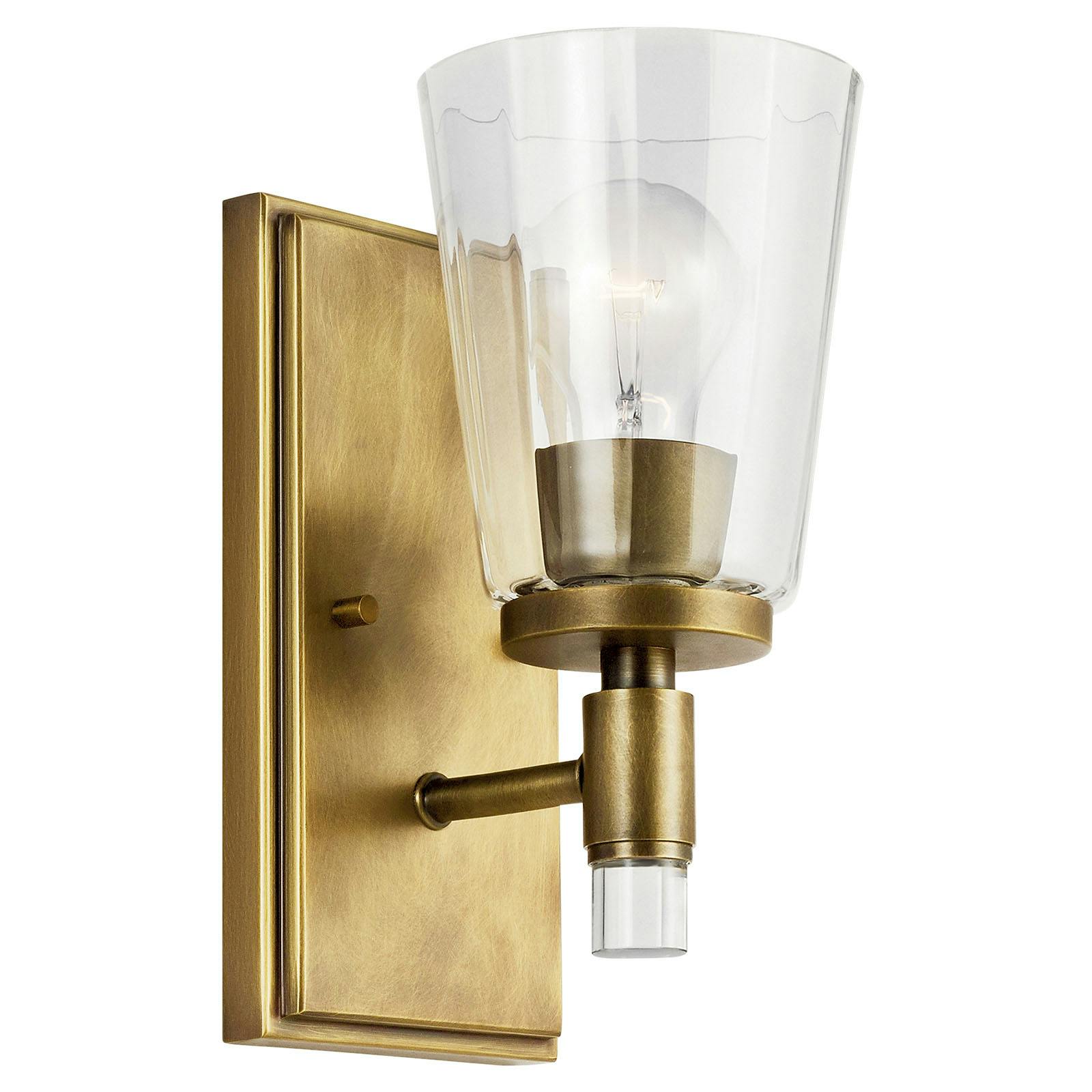 The Audrea™ 1 Light Wall Sconce Natural Brass facing up on a white background