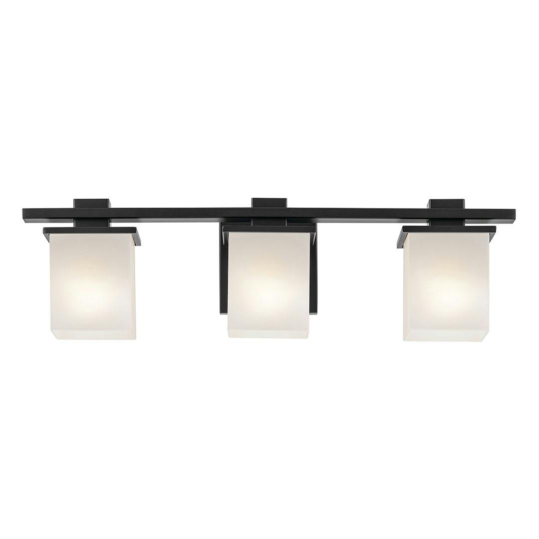 The Tully 24" 3-Light Vanity Light in Black mounted down on a white background