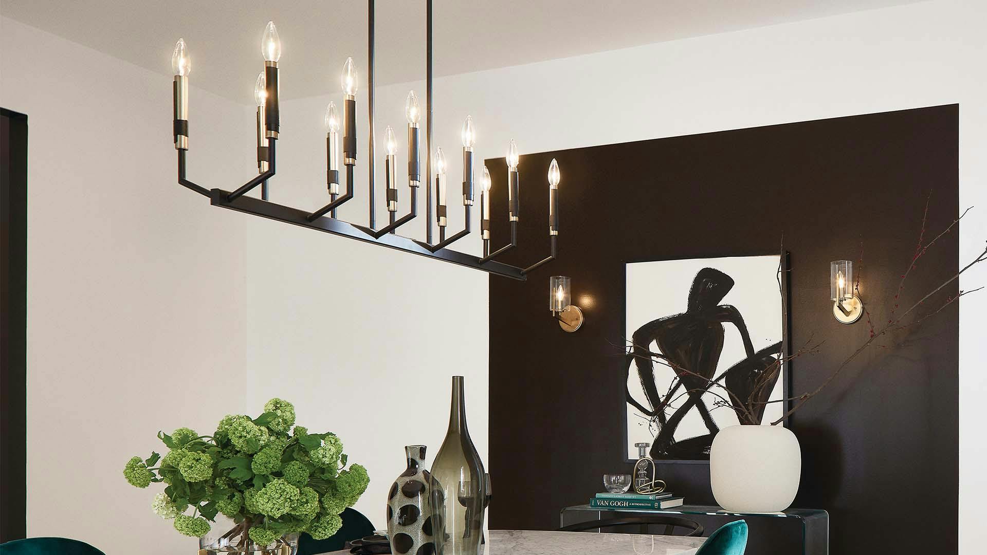 Dining room table with Armand 12-light chandelier in black.