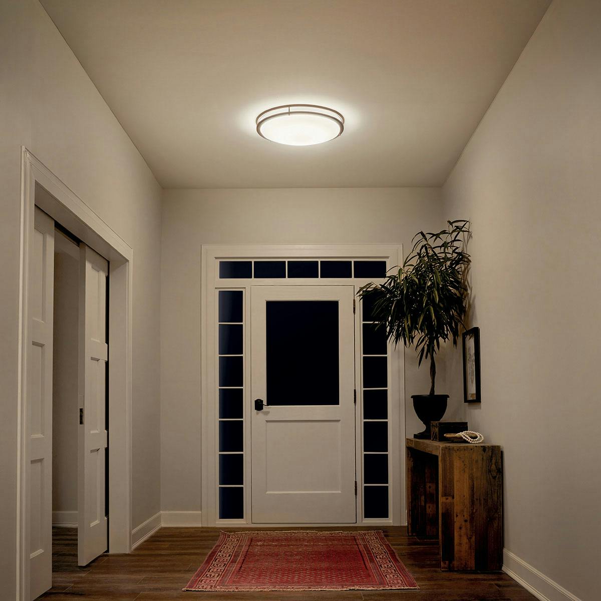 Night time Hallway image featuring Avon flush mount light 10788OZLED
