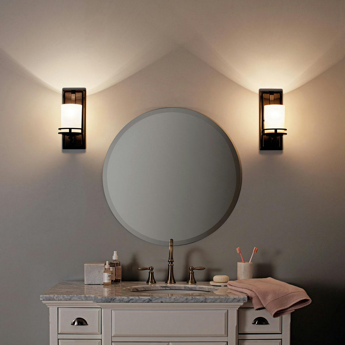 Night time Bathroom featuring Hendrik vanity light 5076OZ