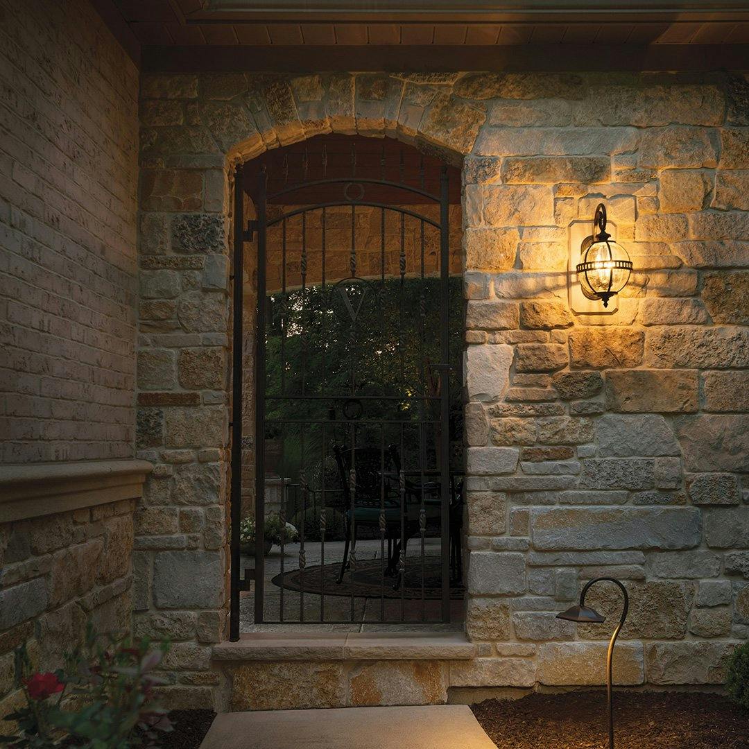Front door with a path light and a Halleron wall light