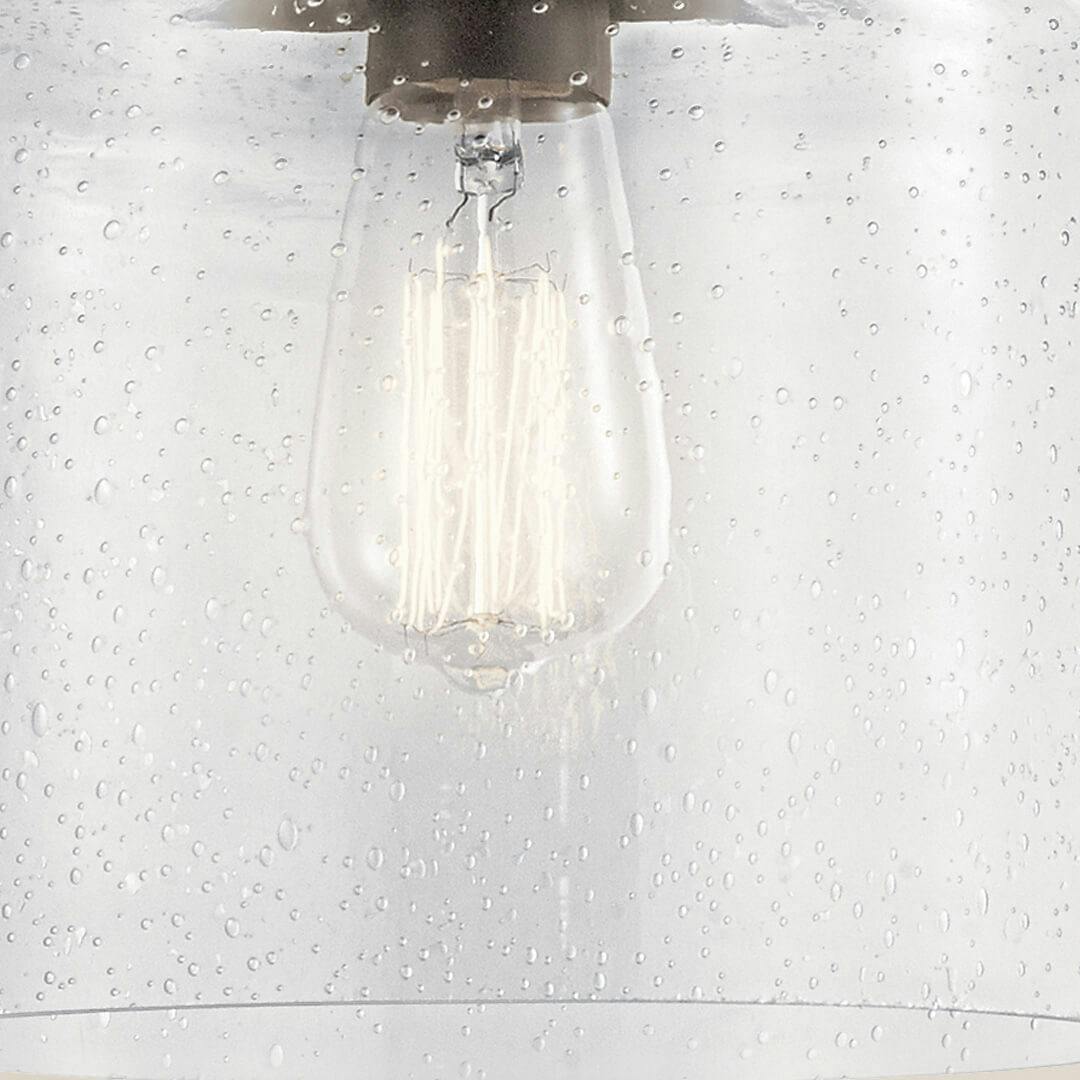 close up of Winslow™ 1 Light Semi Flush Olde Bronze®  glass on a white background