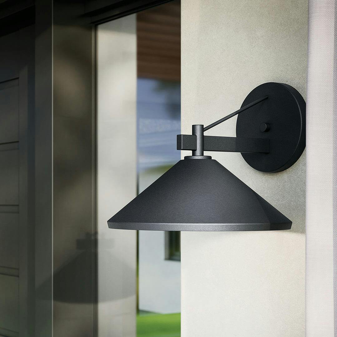 Porch in the day light with the Ripley 12" 1-Light Outdoor Wall Light in Black