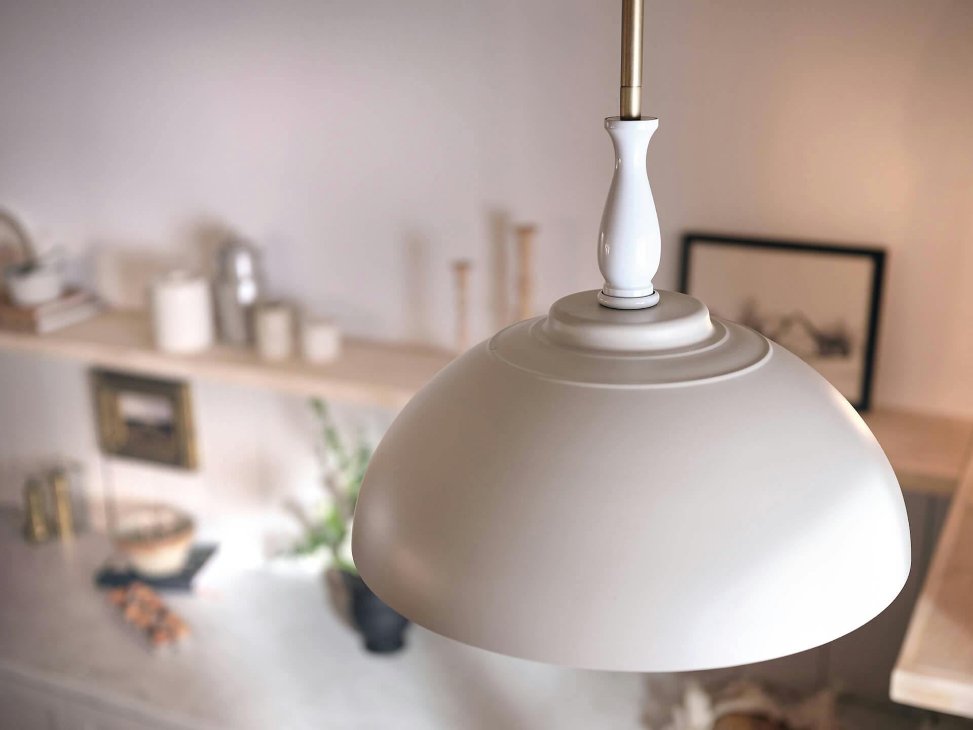 Close up of a white dome pendant lamp