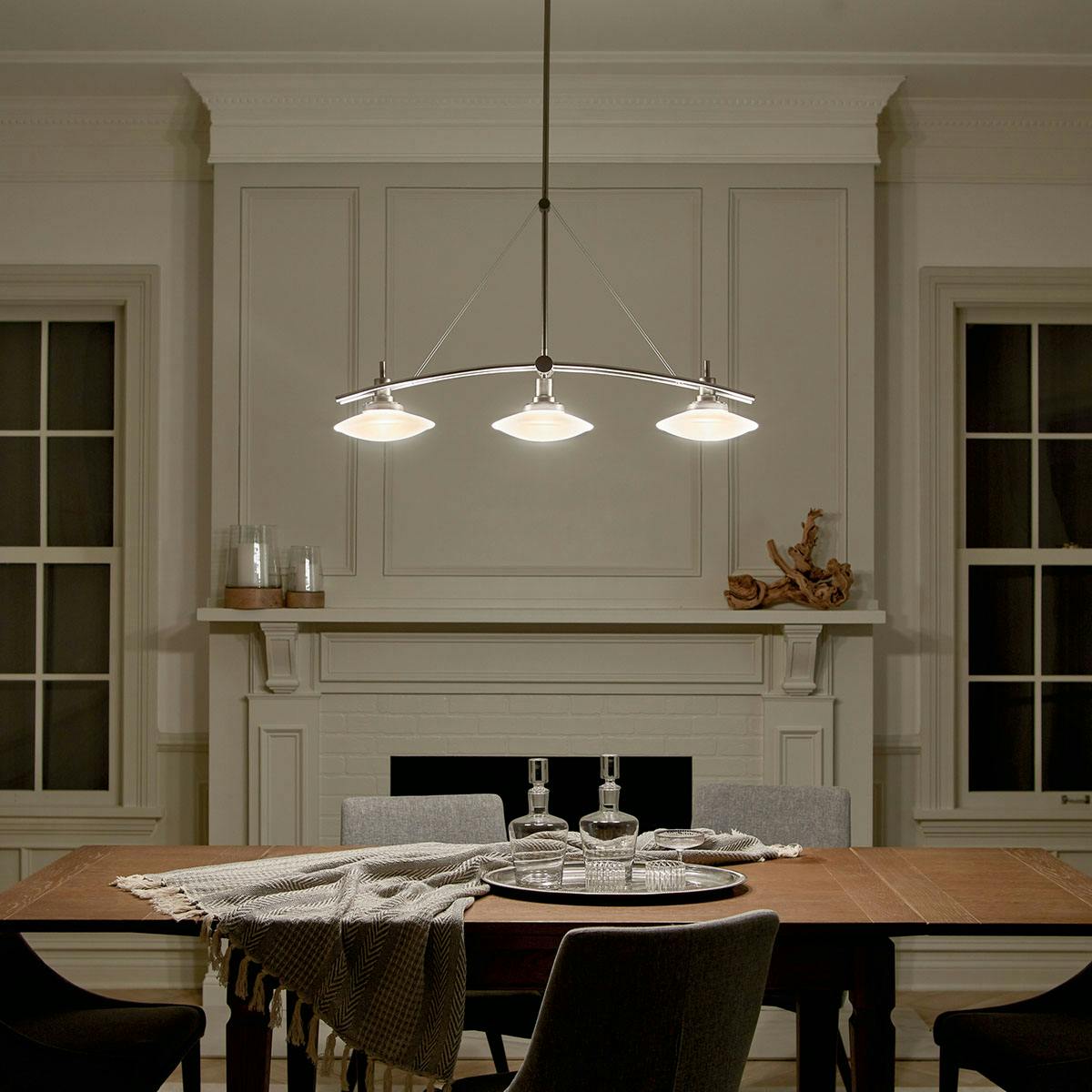 Night time dining room image featuring Structures chandelier 2955NI