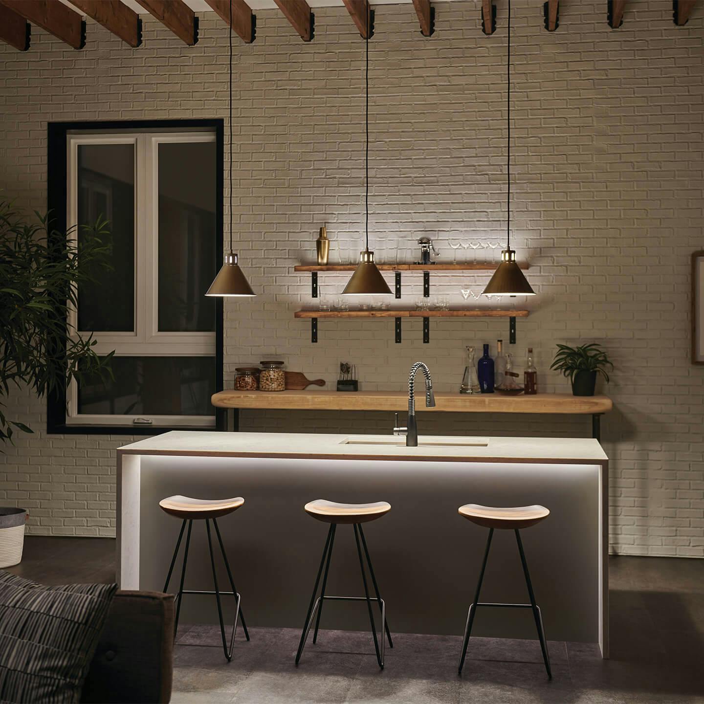 Home bar at night with three Zailey pendant lights hanging