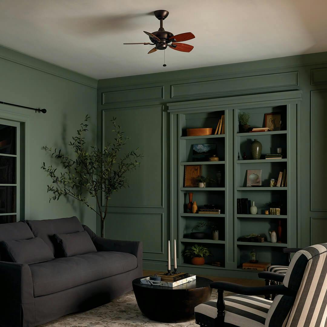 Night time living room with the Canfield 30" Fan Oil Brushed Bronze