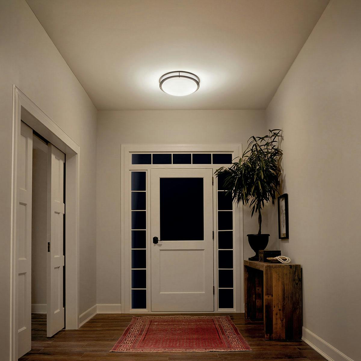 Night time Hallway image featuring Avon flush mount light 10789OZLED