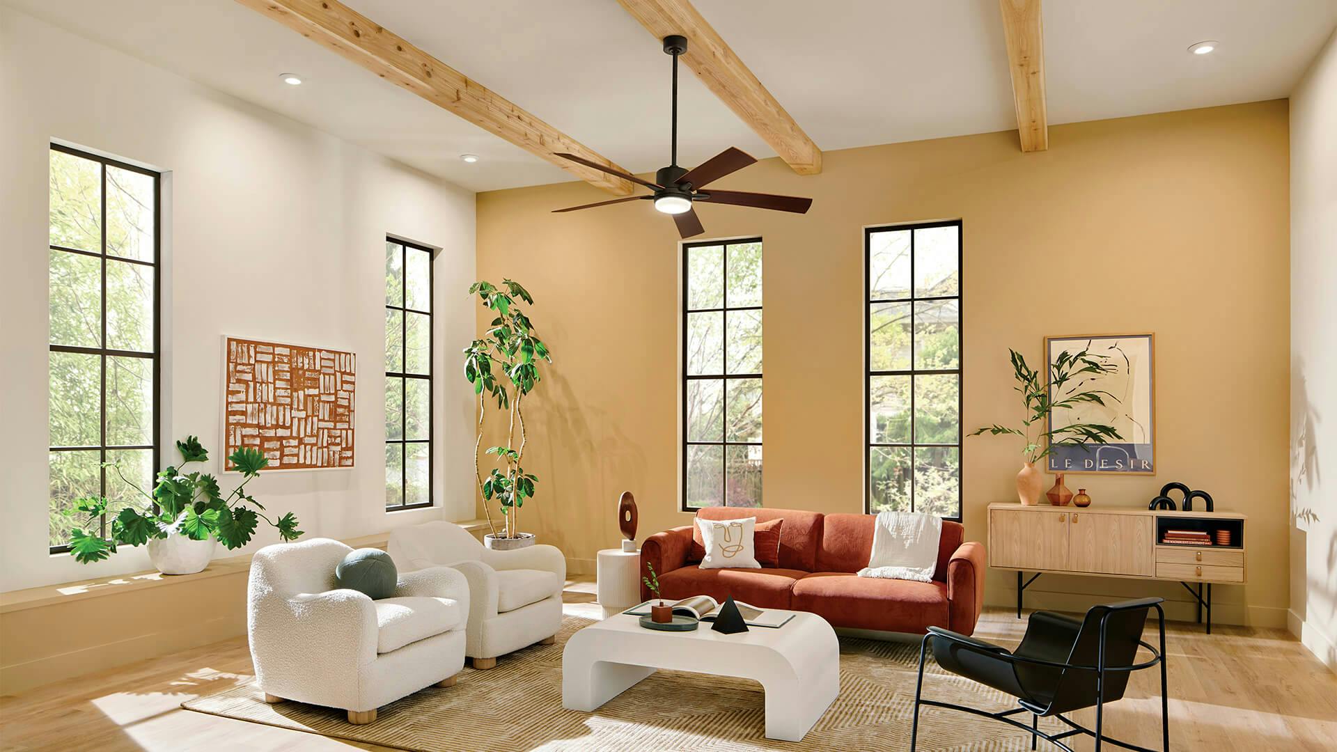 Living room with Lucian Elite XL ceiling fan in olde bronze.