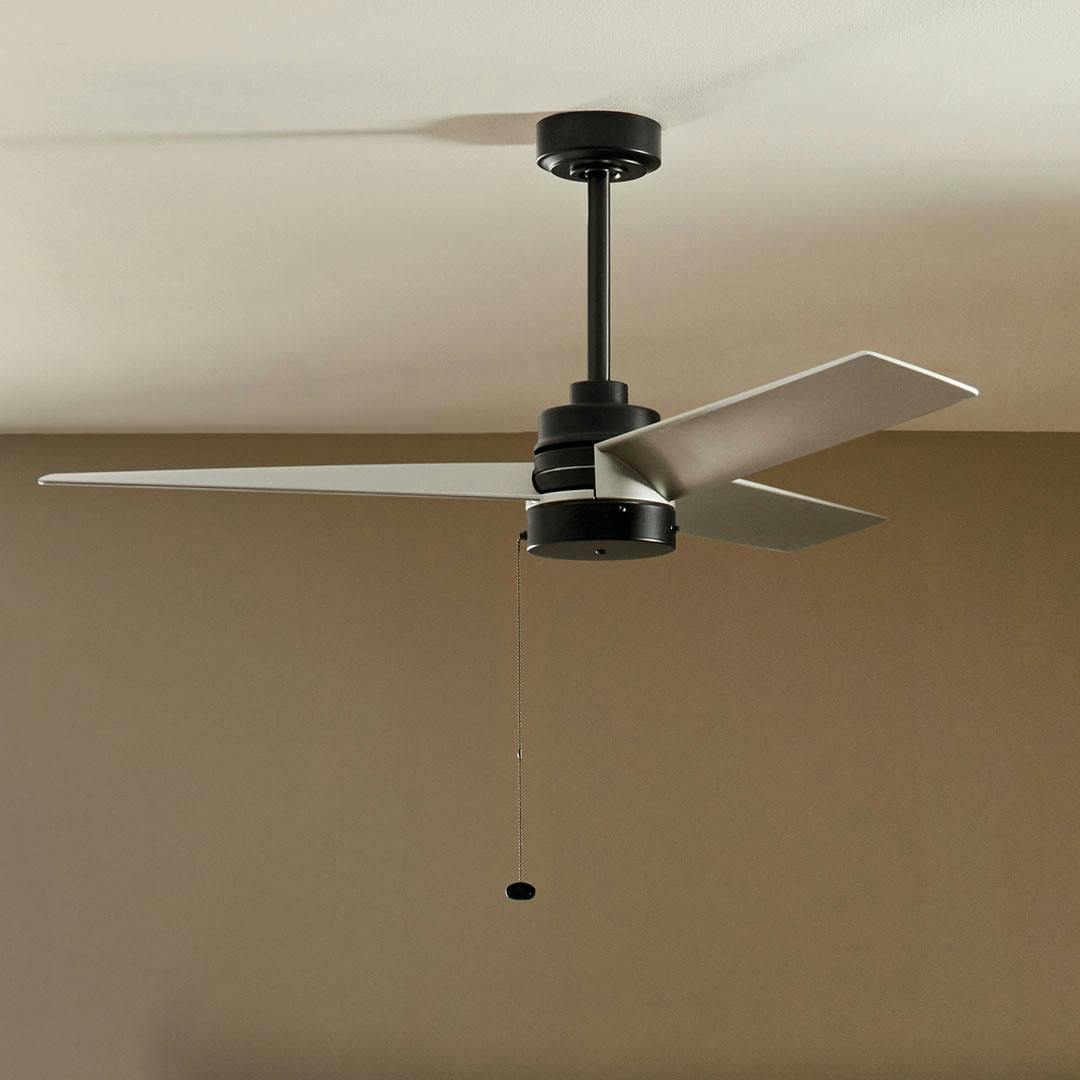 Bedroom in day light with the 52 Inch Spyn Lite Fan in Satin Black with Silver Blades