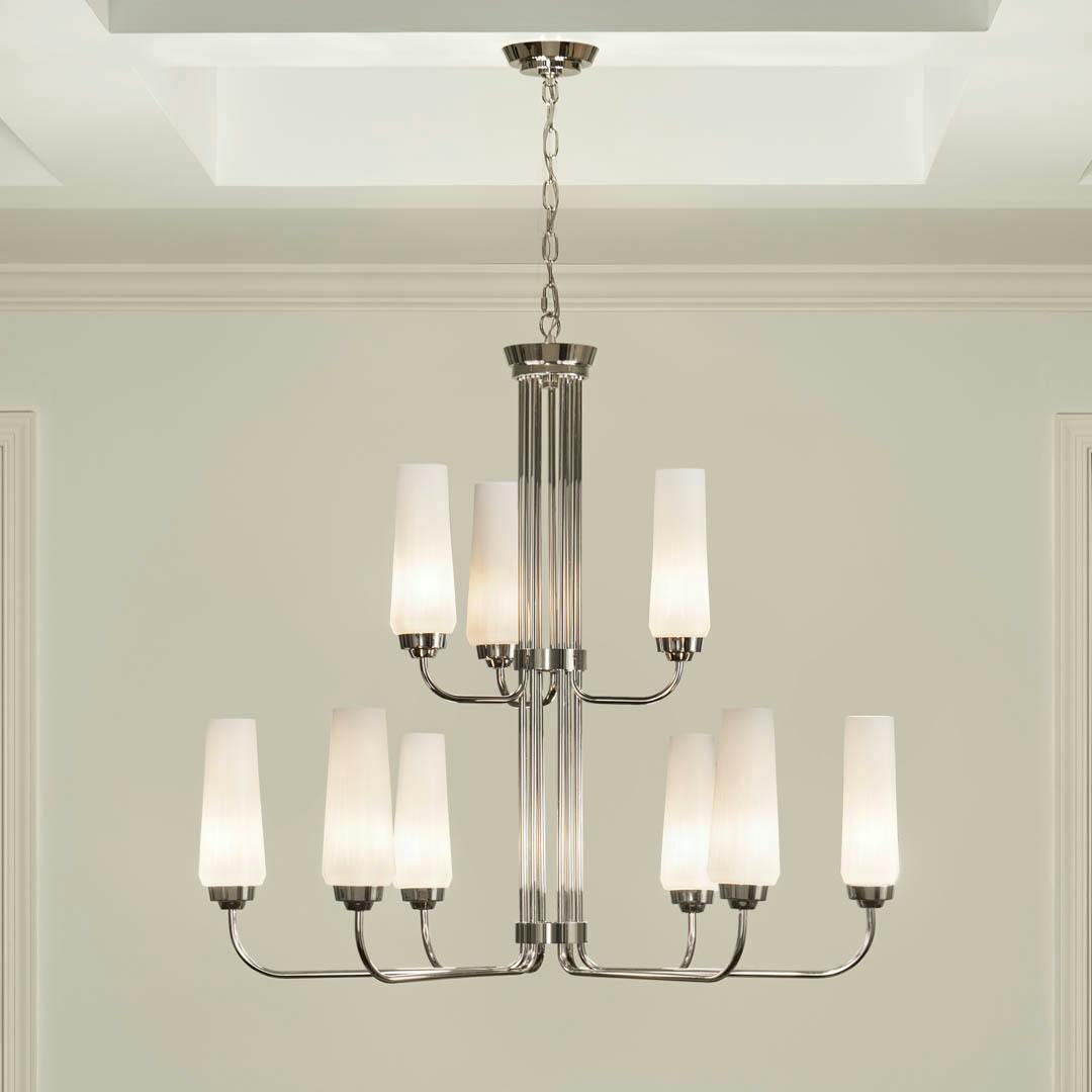 Night time dining room with Truby 9 Light Chandelier Polished Nickel