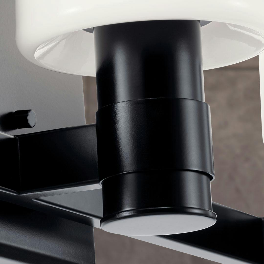 Close up view of the Adani 24 Inch 3 Light Vanity Light with Opal Glass in Black